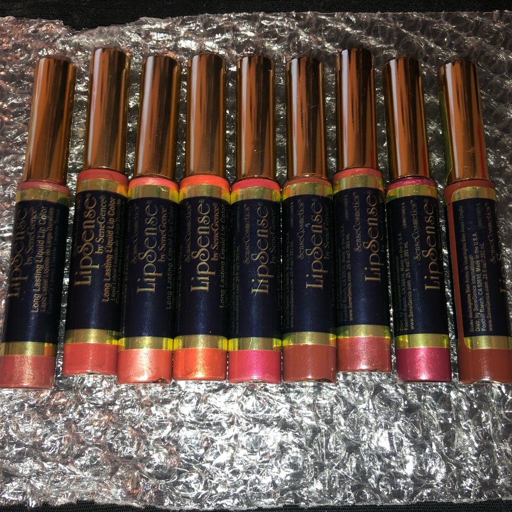 9 LipSense lipsticks and gloss